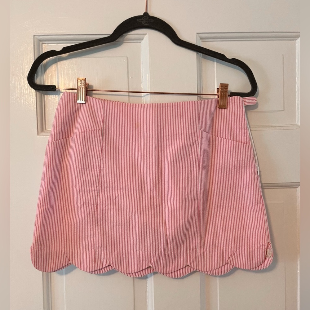 Used Lily Pulitzer pink and white striped skirt with built in shorts in size 0